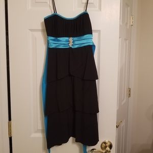 Blue and black dress with jewel